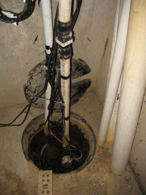 3 sump pumps in a sump pit